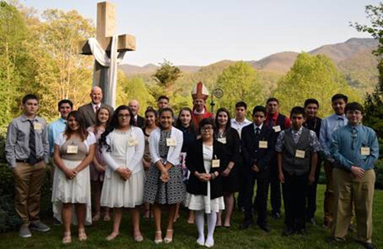 MAGGIE VALLEY — Bishop Jugis traveled to Maggie Valley April 28 to confirm the combined classes from St. Margaret of Scotland Church Maggie Valley in and St. John the Evangelist Church in Waynesville. There were 13 children from St. John, and four childre