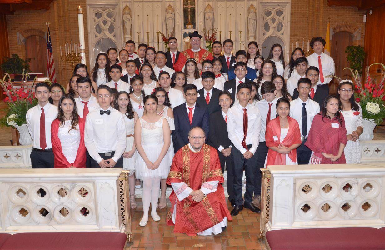 GREENSBORO — During two Masses on May 27, Hispanic youths at Our Lady of Grace Church received the sacrament of confirmation.
