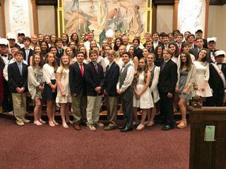 CHARLOTTE — Young people at St. Peter Church were confirmed by Benedictine Abbot Placid Solari during Mass May 20. (Photos provided by Joan Guthrie)