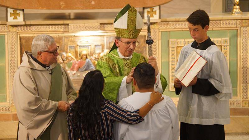 ASHEVILLE —Young people at St. Lawrence Basilica received the sacrament of confirmation from Bishop Peter J. Jugis during Mass Oct. 6. (John Cosmas | Catholic News Herald)