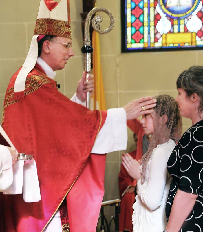 TRYON — Bishop Peter Jugis celebrated Mass and the rite of confirmation at St. John the Baptist Church June 7, conferring the sacrament of confirmation on parishioners Itzel Avellaneda-Cruz, Cailin Bennett (pictured), Maria Chavez, Arthur DeCotiis, Sarah