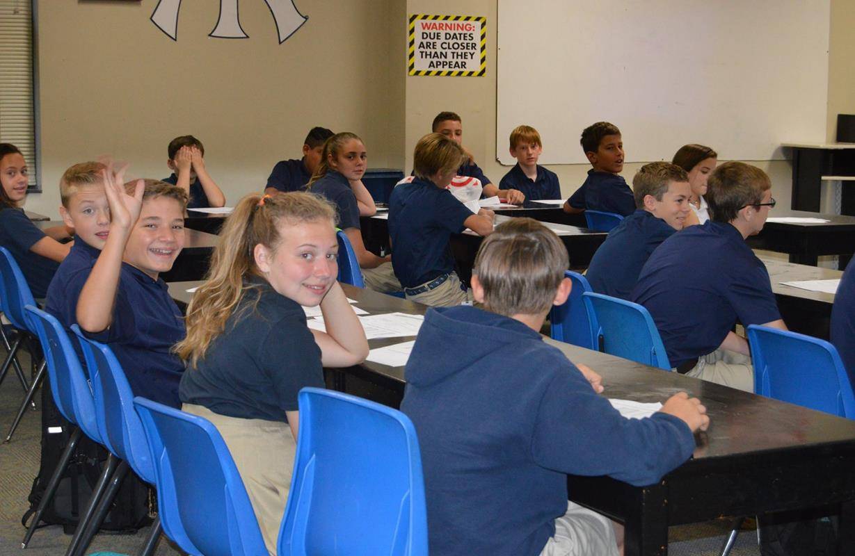 CHARLOTTE — Seventh and eighth graders return to Holy Trinity Middle School excited for the year. (Photos via Facebook)