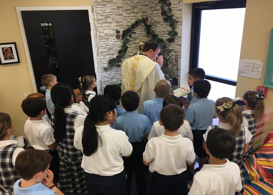 SALISBURY — Third grade teacher Mrs. Erin Brinkley turned a small corner of the classroom into a prayer retreat. Father John Eckert blessed the classroom grotto. (Photos provided by Robin Fisher)