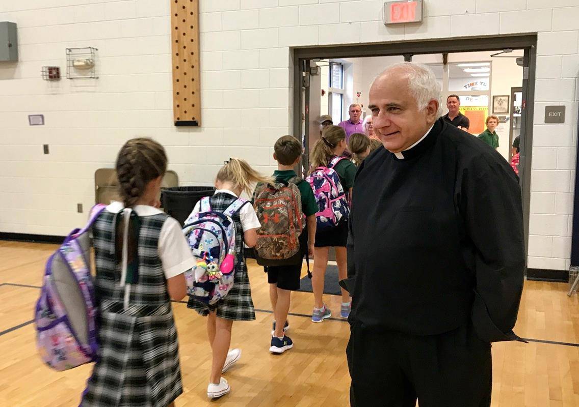 HUNTERSVILLE — Students are welcomed back to school as they go to their classrooms at St. Mark on Wed., August 23. (Photo provided by Amy Burger)