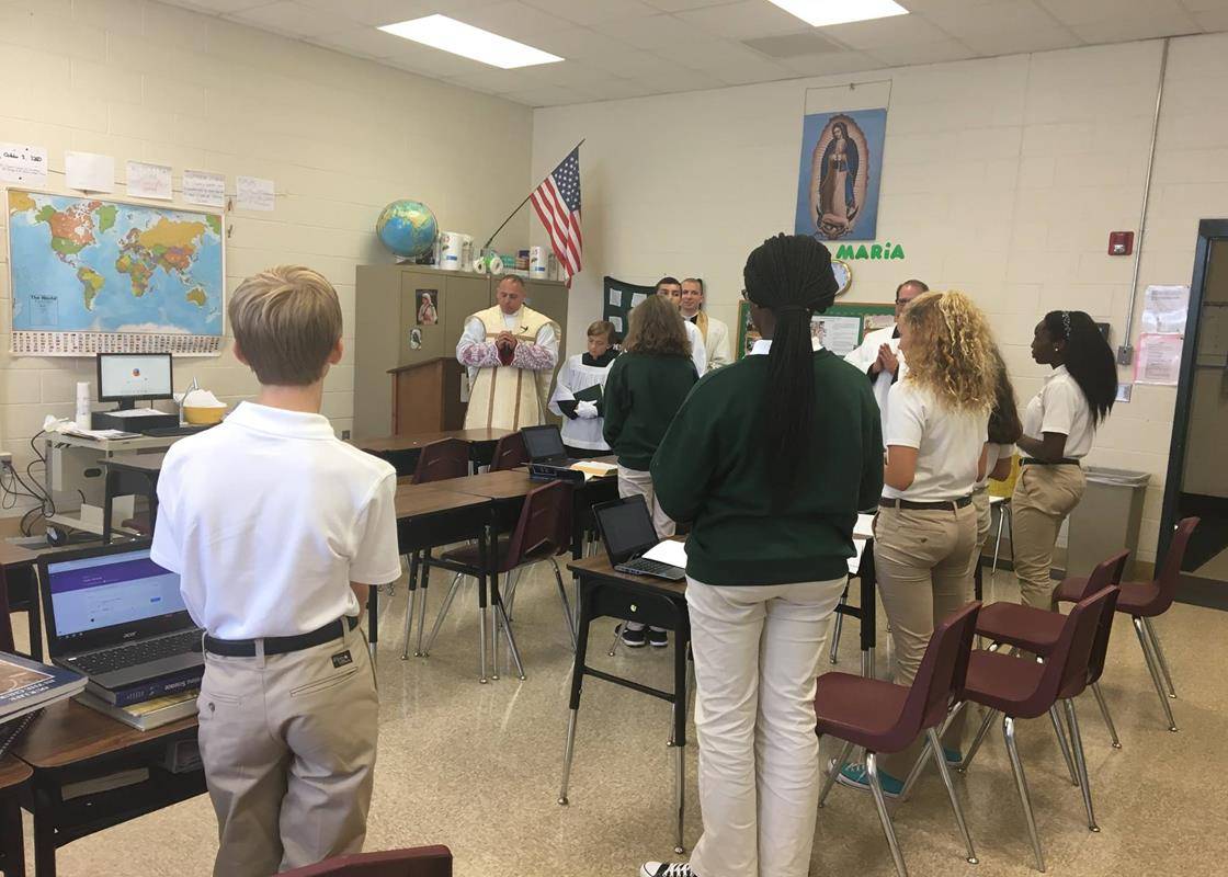 GASTONIA — The first week of school at St. Michael School ends with a blessing. Father Mat-thew Buettner blessed the hallways, classrooms and offices. (Photos via Facebook)