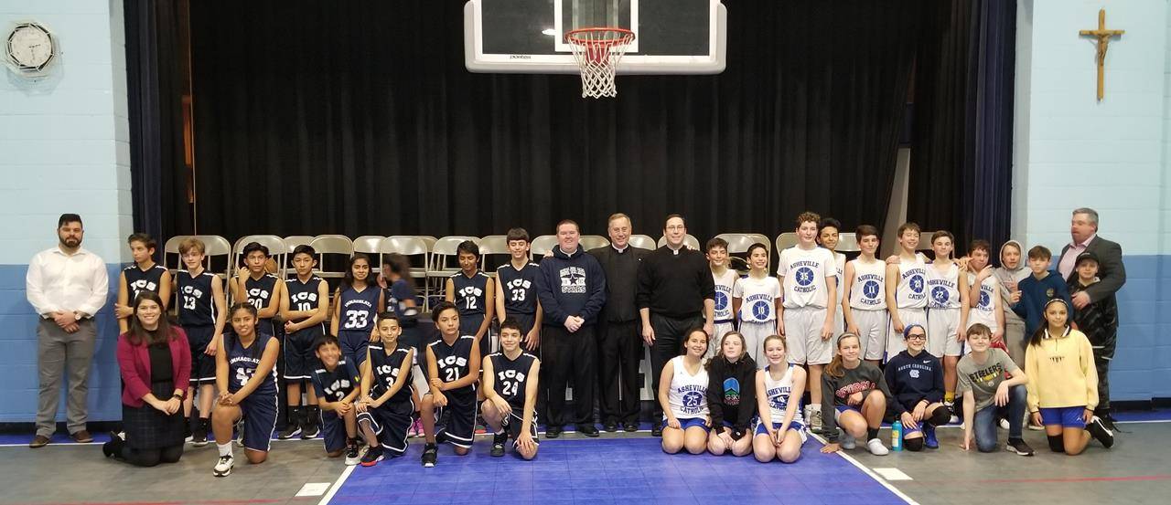 Asheville Catholic and Immaculata Catholic schools renewed their mountain-area rivalry, competing in boys and girls basketball during Catholic Schools Week. (Photos provided by Father Christian Cook)