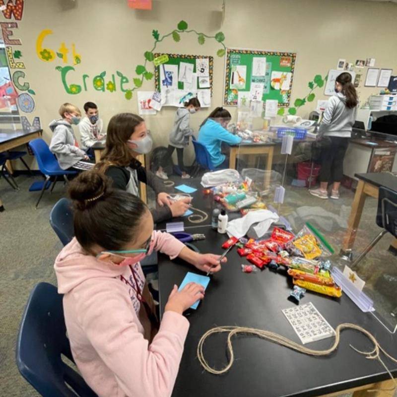 CHARLOTTE —Holy Trinity Middle School families donated food to package and deliver more than 300 lunches to Dilworth Soup Kitchen during Catholic Schools Week. Lunches were also sent to Roof Above and Catholic Charities’ food pantry. (Photos via Facebook)