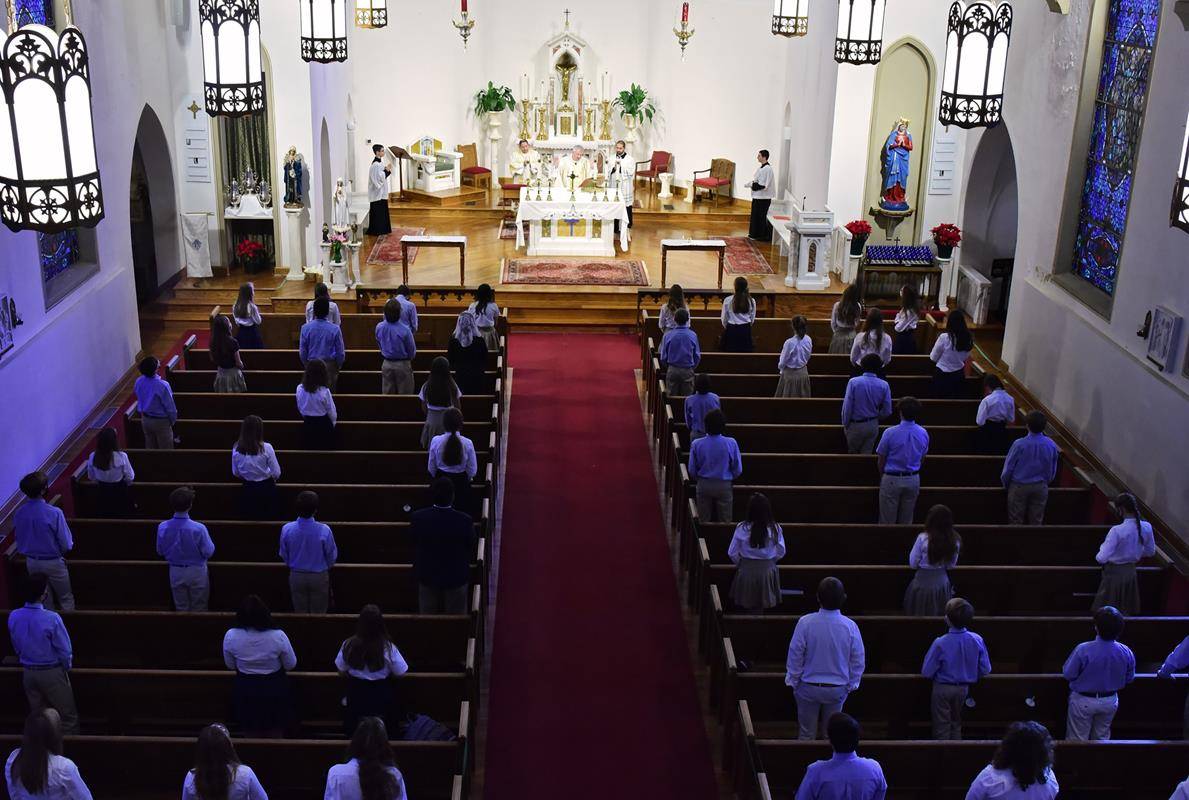 CHARLOTTE — Holy Trinity Middle School students attended Mass at St. Patrick Cathedral Feb. 2 in celebration of Catholic Schools Week. Msgr. Patrick Winslow celebrated the Mass.