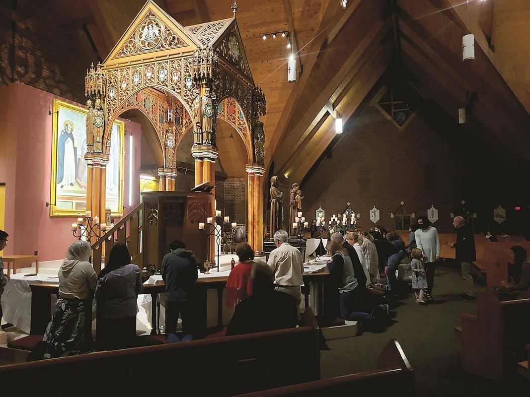 Parishioners at St. Thomas Aquinas Church in Charlotte took part in a pilgrimage and veneration of more than 100 saints’ relics over last weekend, in conjunction with Masses for All Saints Day Nov. 1.