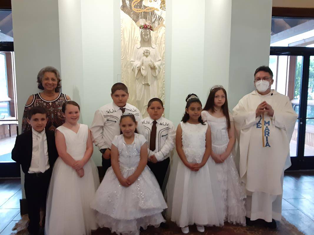 Children at Immaculate Heart of Mary Mission in Hayesville received their First Holy Communion during Mass May 15 offered by Father Alex Ayala, pastor. (Photo provided by Ruth Charlesworth and Craig Allen)