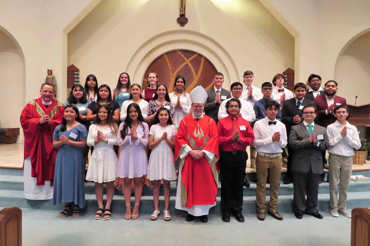 Young people at St. Philip the Apostle Church in Statesville received the sacrament of confirmation May 11 during a Mass offered by Abbot Placid Solari of Belmont Abbey and Father Thomas J. Kessler, pastor. (Photo provided by Connie Ries)