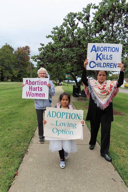 Several parishioners from St. Philip the Apostle in Statesville, joined members of two local churches to celebrate Respect Life Month in downtown Troutman on Oct. 2