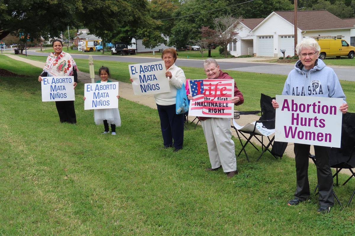 Several parishioners from St. Philip the Apostle in Statesville, joined members of two local churches to celebrate Respect Life Month in downtown Troutman on Oct. 2