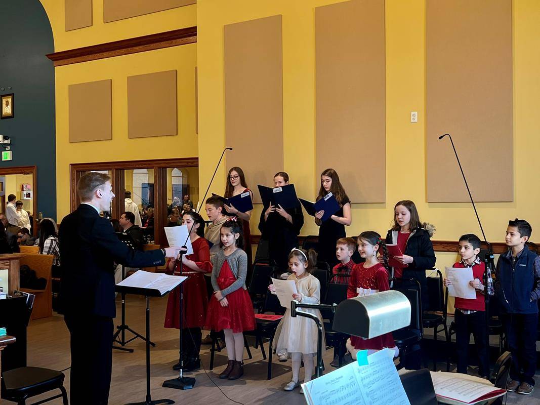 Youth choir at Queen of the Apostles Church in Belmont.