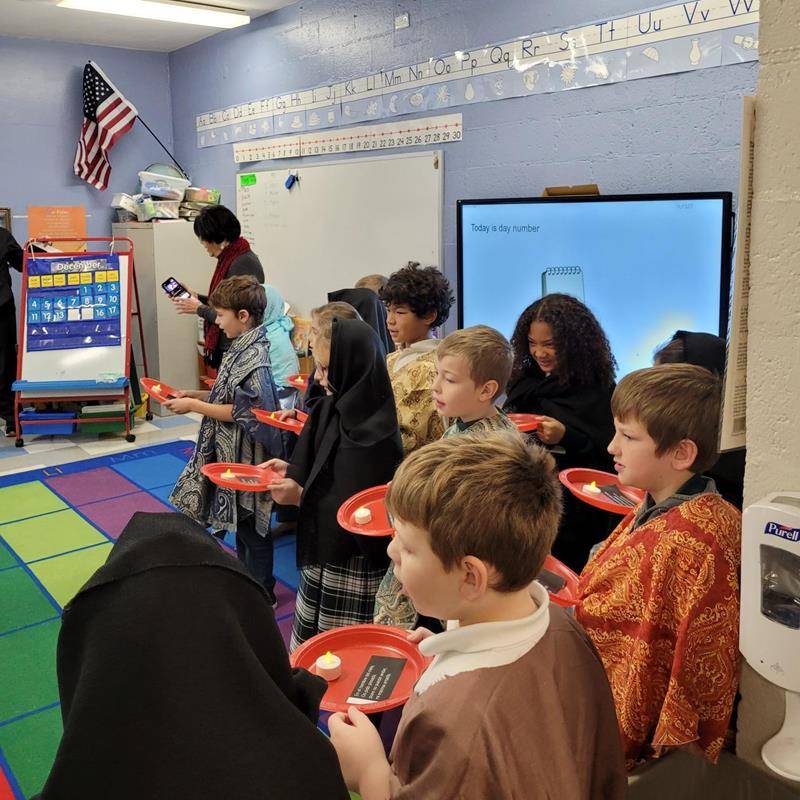 St.Michael School celebrated Las Posadas, the Hispanic religious holiday commemorating the search for an inn by St. Joseph and the Blessed Virgin Mary on the night of our Savior's birth.