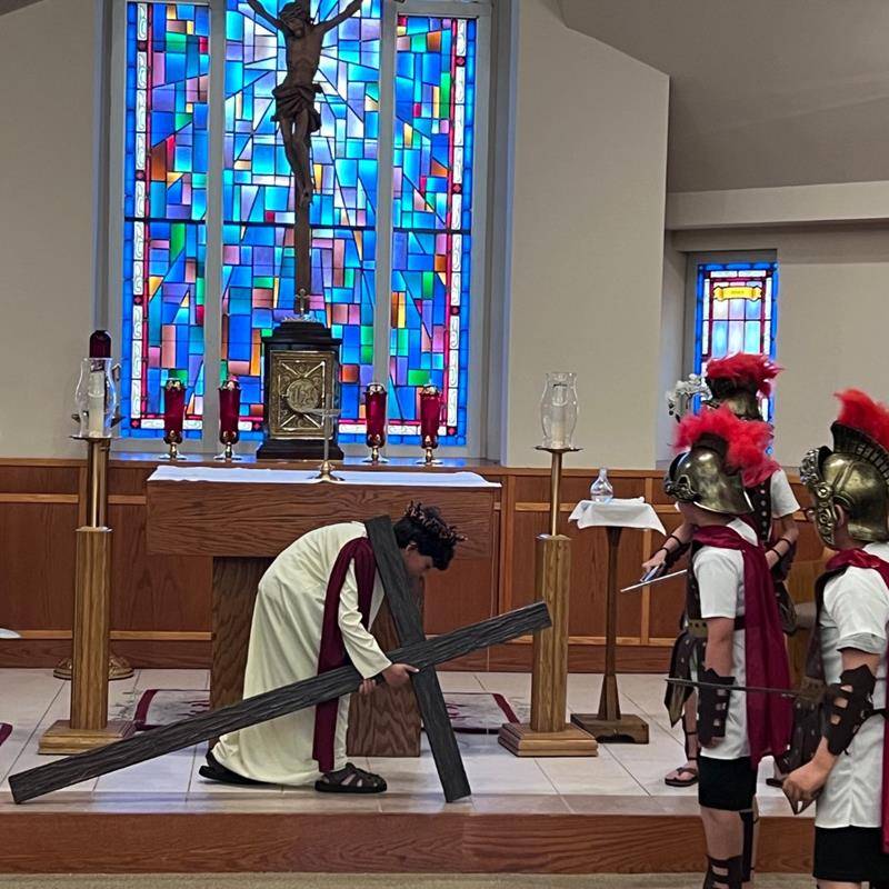 Fourth grade students at St. Matthew School performed live Stations of the Cross during Holy Week. (Provided photos)