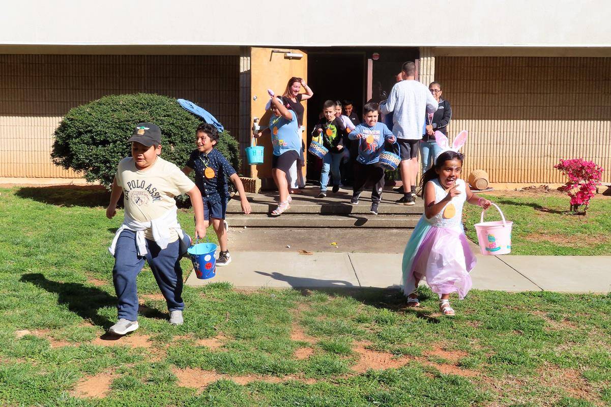 Outside activities included three separate egg hunts for different age levels, and a huge inflatable slide.