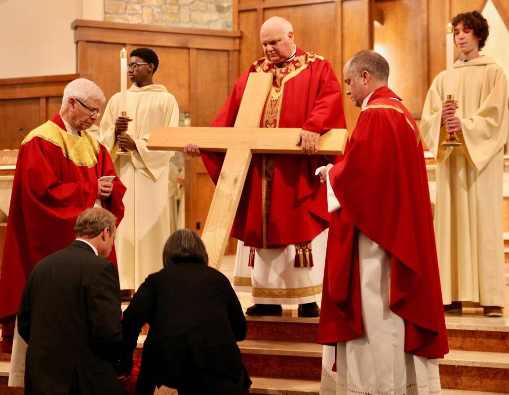 Good Friday Veneration of the Cross at St. Pius X in Greensboro. (Photos provided)