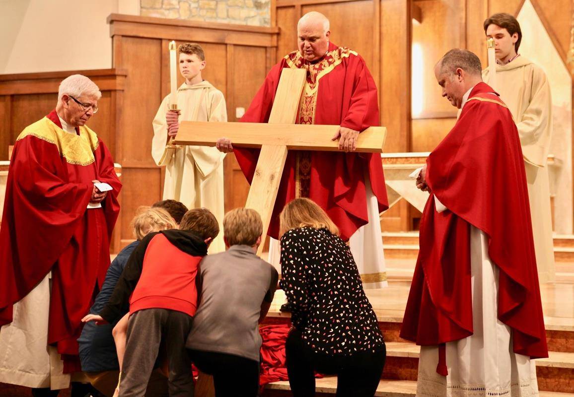 Good Friday Veneration of the Cross at St. Pius X in Greensboro. (Photos provided)