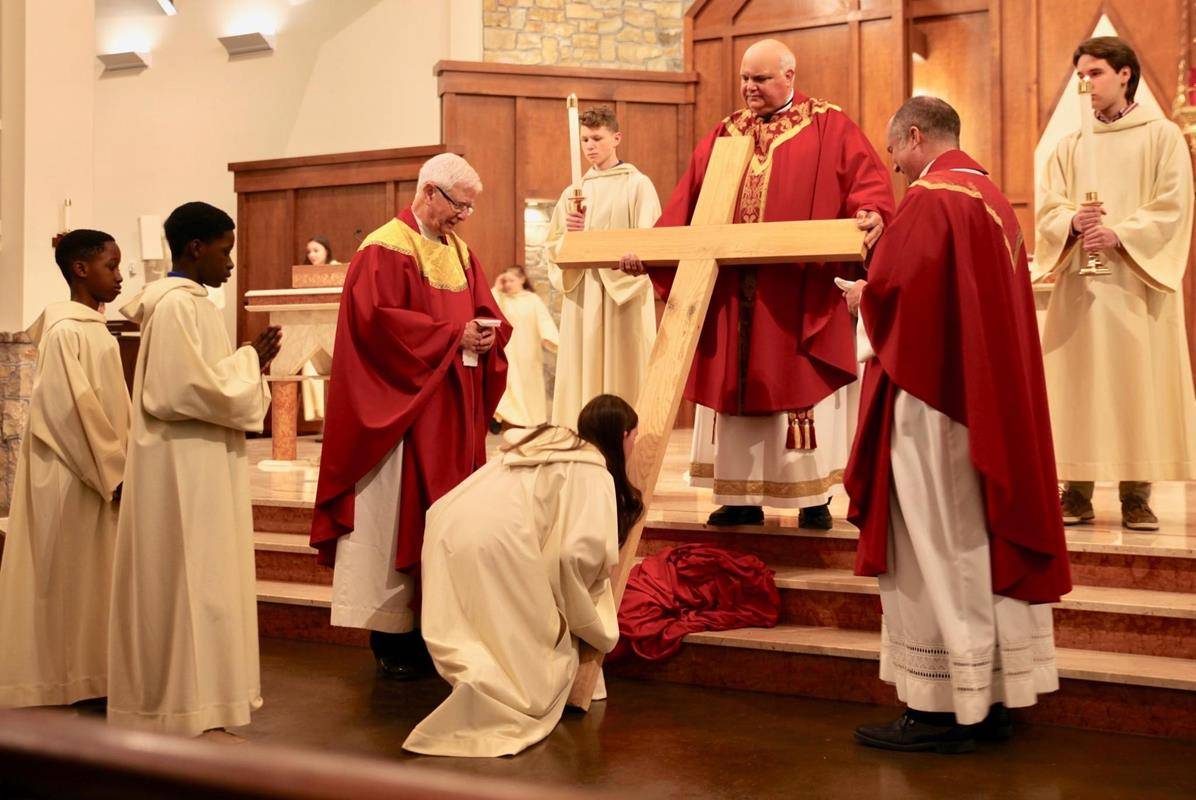 Good Friday Veneration of the Cross at St. Pius X in Greensboro. (Photos provided)