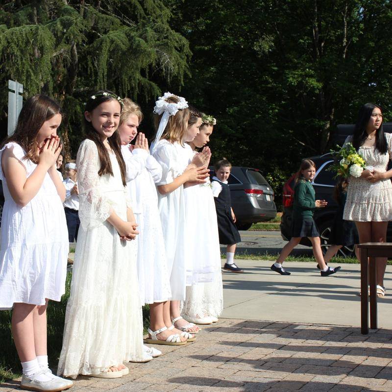 St. Leo School students crowned Mary, symbolic of Mary as Queen of Heaven and of our lives on May 12. (Provided photos)