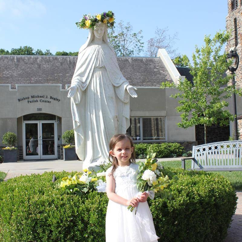 St. Leo School students crowned Mary, symbolic of Mary as Queen of Heaven and of our lives on May 12. (Provided photos)