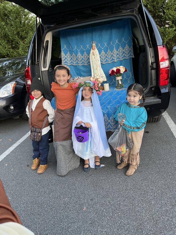 St. Joseph Church in Newton held an All Saints Day fair with trunk or treat and saint games.