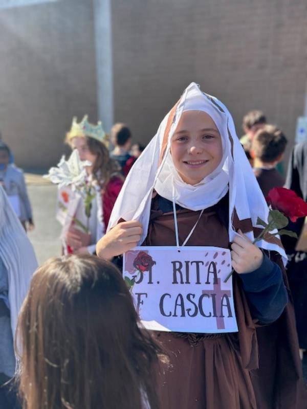 Father Casey Coleman, pastor, led the procession and offered a short lesson about saints, gave a blessing of all present, and led a prayer for the faithful departed for All Soul’s Day.