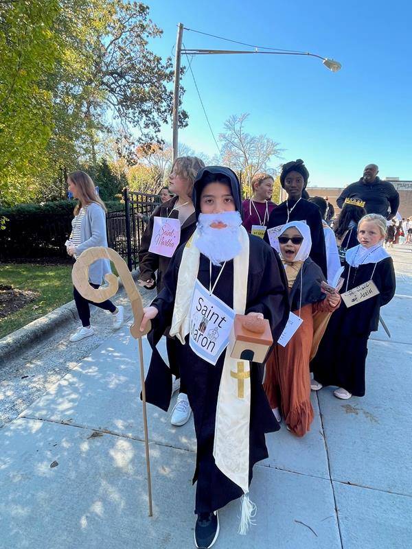 Father Casey Coleman, pastor, led the procession and offered a short lesson about saints, gave a blessing of all present, and led a prayer for the faithful departed for All Soul’s Day.