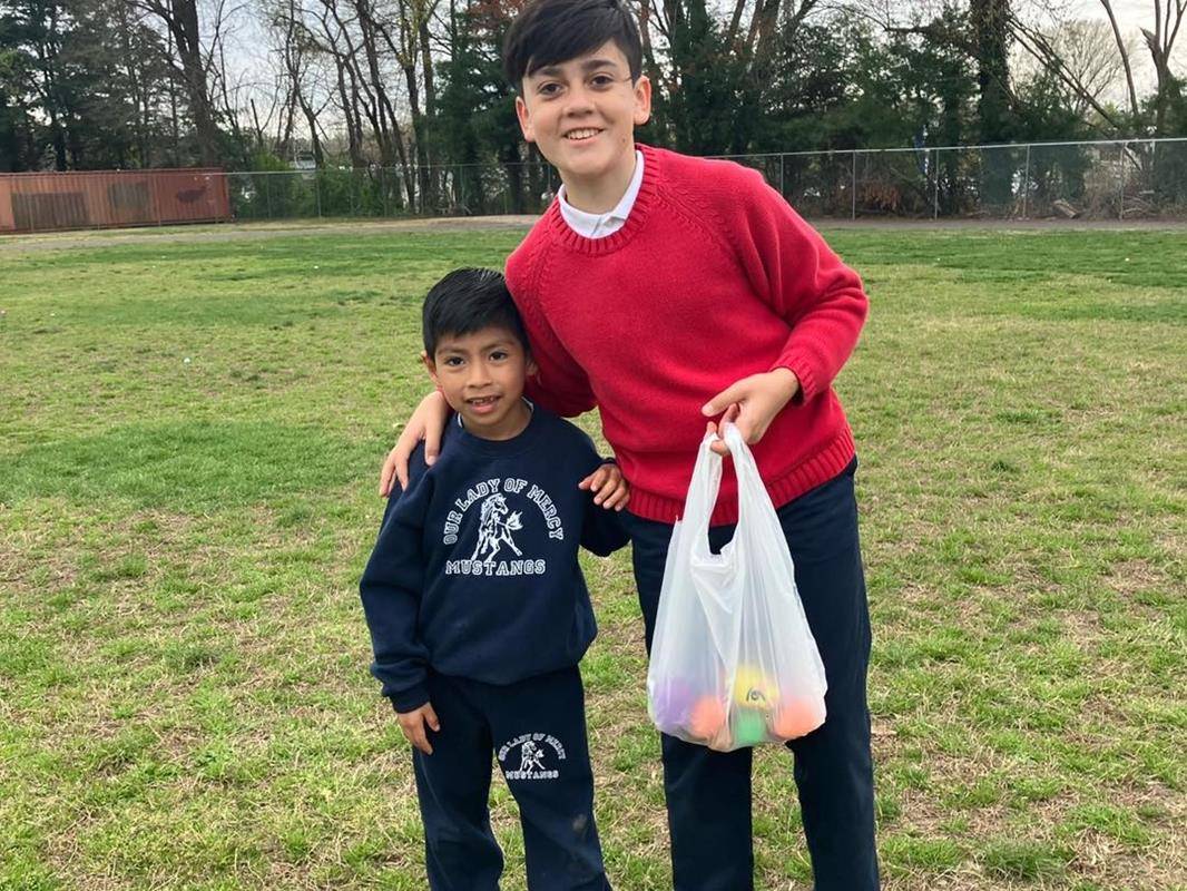 Our Lady of Mercy students enjoyed an Easter egg hunt with their sixth grade buddies..