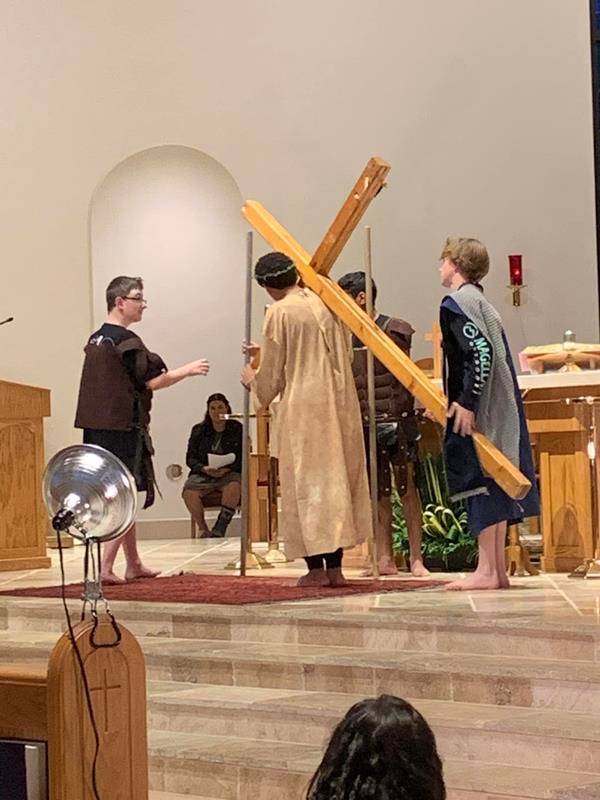 Youth ministry at St. Therese Church in Mooresville recreate living Stations of the Cross.