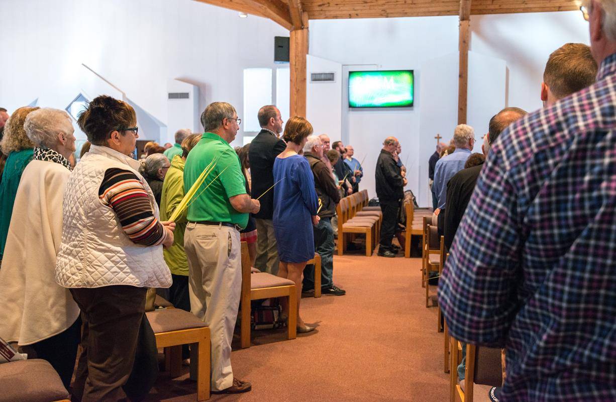 Palm Sunday Mass at St. Luke Church in Charlotte. (By Tara Heilingoetter)