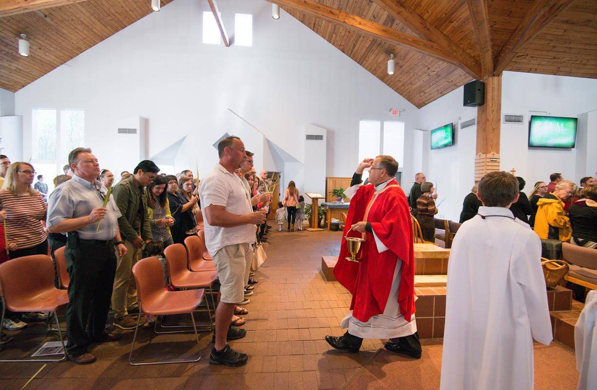 Palm Sunday Mass at St. Luke Church in Charlotte. (By Tara Heilingoetter)