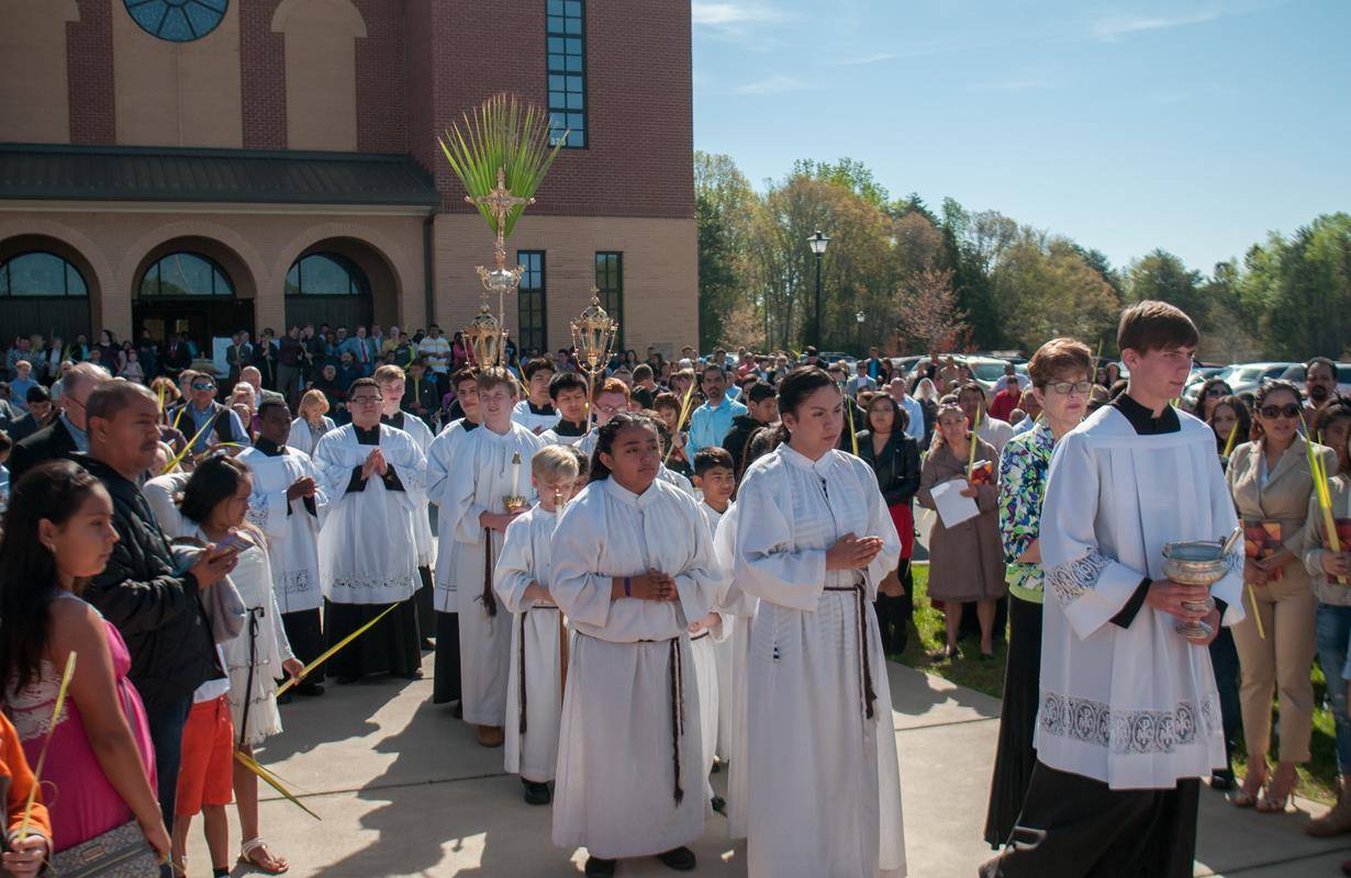Blessing of the palms and procession before Mass at Sacred Heart in Salisbury. (By Bill Washington)