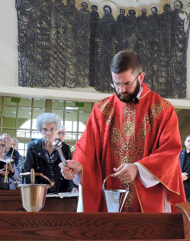 Palm Sunday at St. Mark Church in Huntersville. (By Amy Burger)