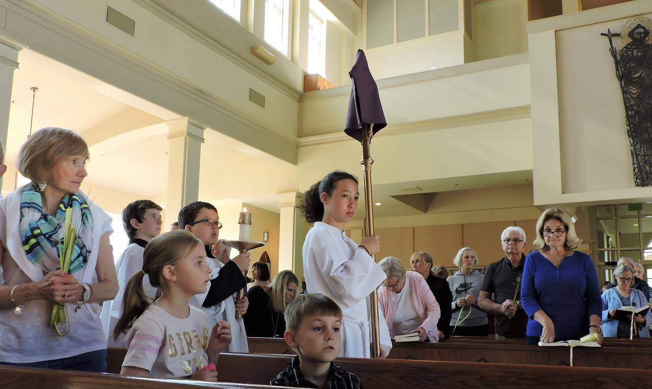 Palm Sunday at St. Mark Church in Huntersville. (By Amy Burger)
