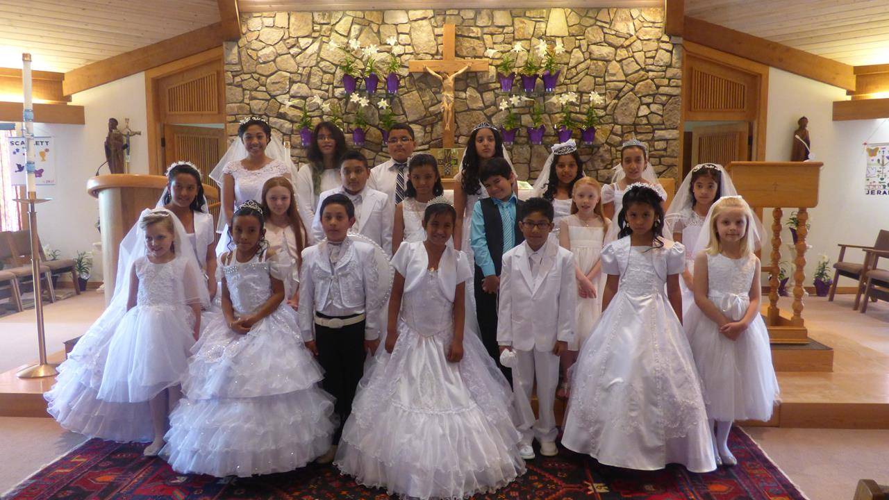 BOONE — Twenty children received their first Holy Communion April 29 at St. Elizabeth Church. (Amber Mellon | Catholic News Herald)