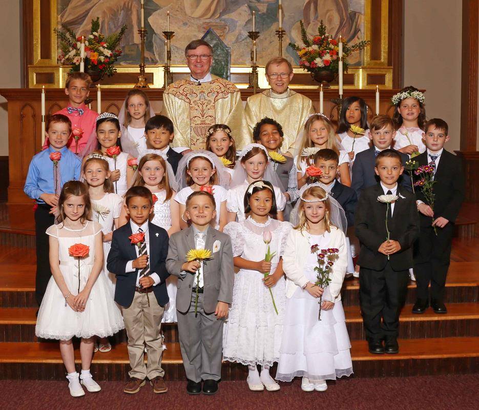 CHARLOTTE — Forty-two children received their first Communion at St. Peter Church May 6. (Photos by Eileen O'Neill)