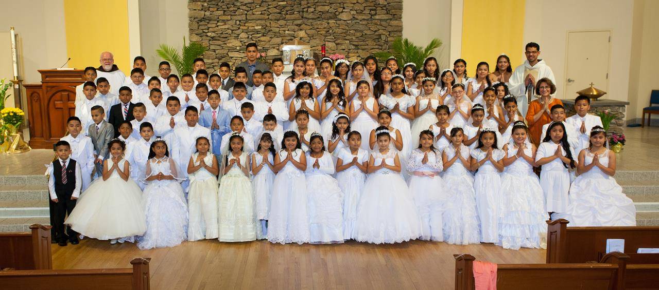 HENDERSONVILLE — Children at Immaculate Conception Church recently celebrated their first Holy Communion. (Photos provided by Capuchin Franciscan Father Martin Schratz)