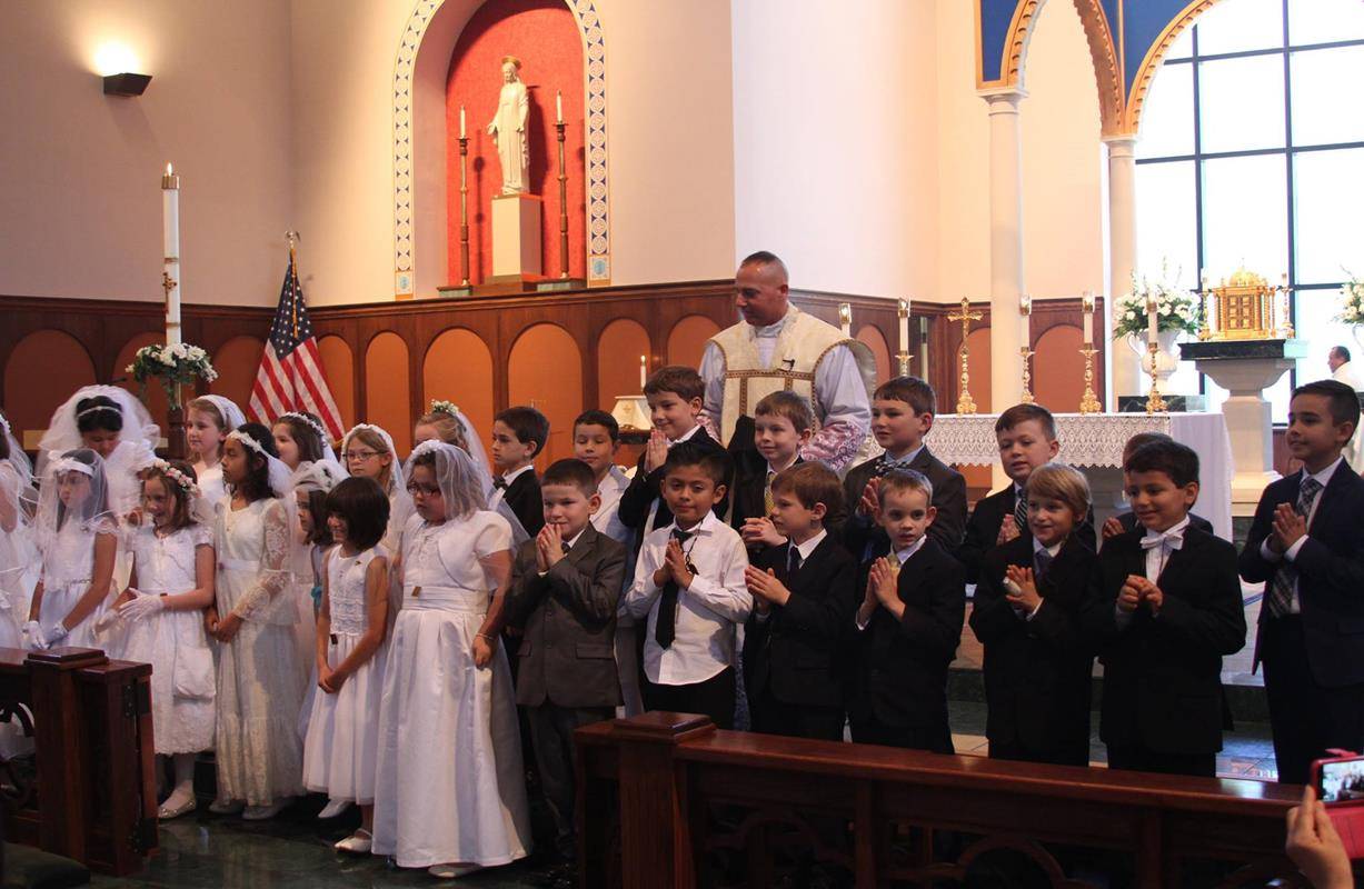 GASTONIA — First Communicants at St. Michael Church made their First Holy Communion May 7. (Photos by Scott Temple via Facebook)
