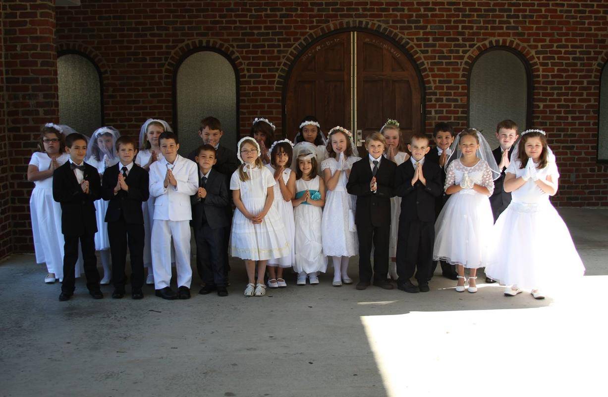 GASTONIA — First Communicants at St. Michael Church made their First Holy Communion May 7. (Photos by Scott Temple via Facebook)