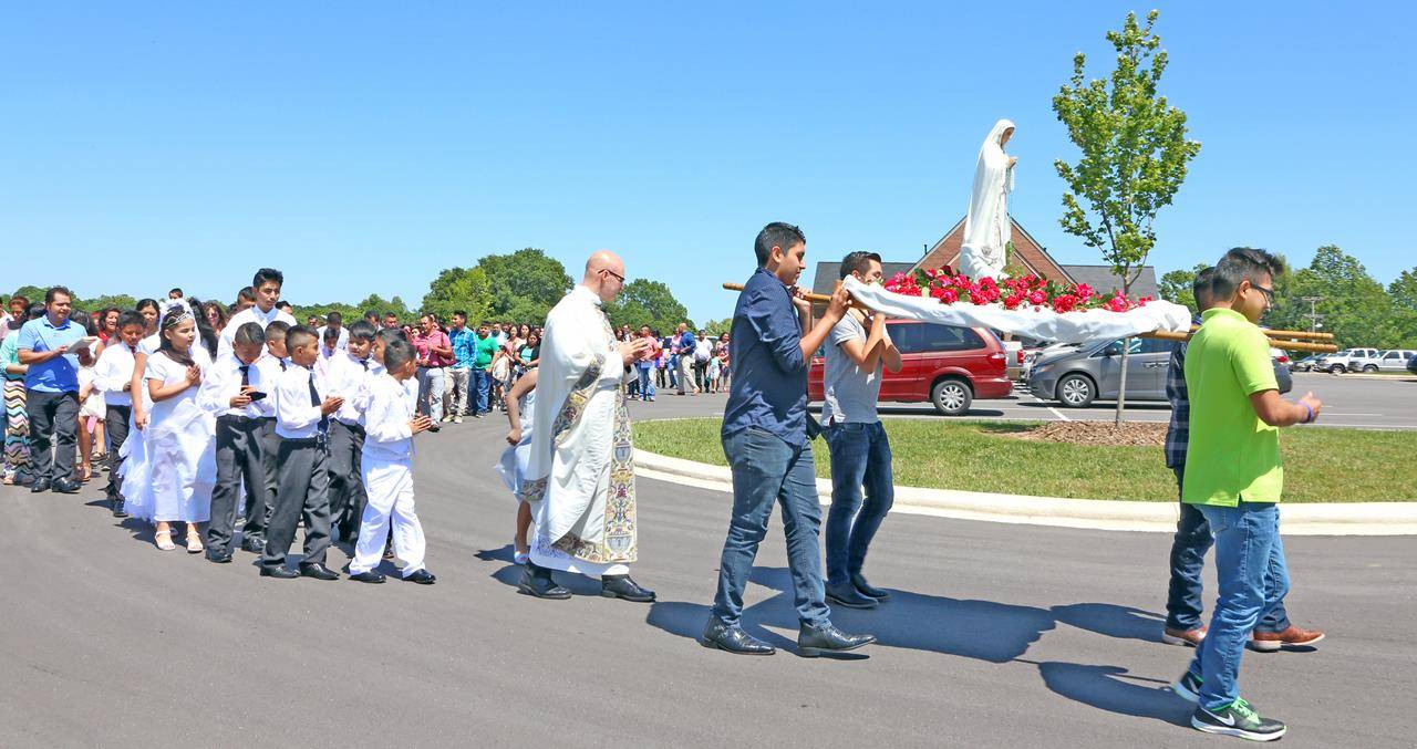 SHELBY — The statue of Our Lady of Fatima was crowned and taken in procession in front of the church in honor of the 100th anniversary of the Fatima apparition and miracles. (Photo by Giuliana Polinari Riley)